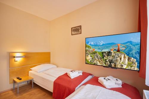 Posteľ alebo postele v izbe v ubytovaní Residence AlpenHeart