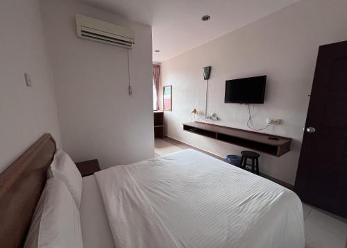 SL Villa Guesthouse, Kuantanにあるベッド