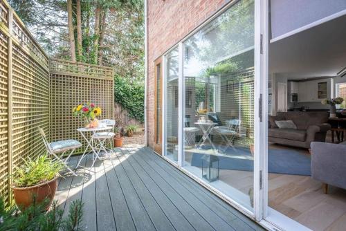 an internal view of a house with a sliding glass door at 3 Drayman Square in Southwold