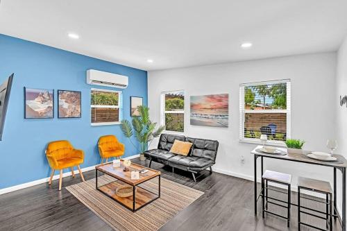 a living room with a couch and a table at Hollywood 2 Bdrm Beach Vacation & Hard Rock Sc02 in Hollywood