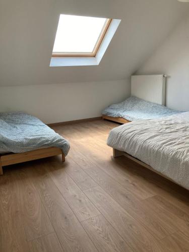 Postel nebo postele na pokoji v ubytování Bright appartement