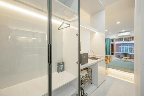 Ένα μπάνιο στο Q Hotel & Apartment Da Nang