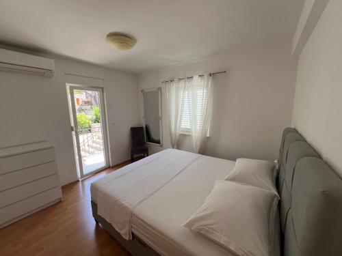 Postel nebo postele na pokoji v ubytování Ana Exclusive Apartments