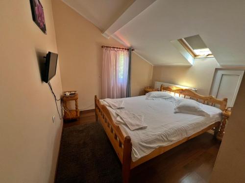 Postel nebo postele na pokoji v ubytování Casa Potcoava