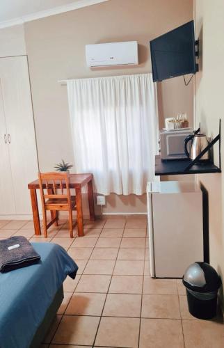 Kuchyň nebo kuchyňský kout v ubytování Alpha B Lodging