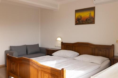 Letto o letti in una camera di Gostišče Pri Dveh Petelinih