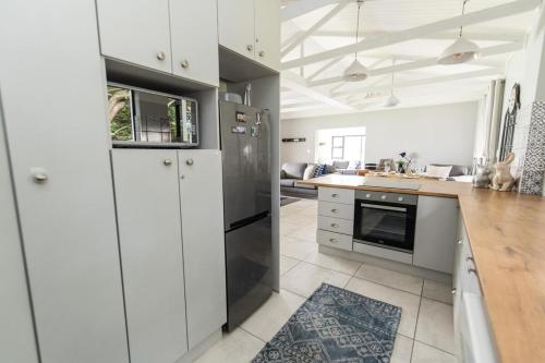Η κουζίνα ή μικρή κουζίνα στο Modern 3 Bedroom In The Heart Of Pe