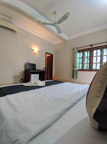 Katil atau katil-katil dalam bilik di IKI IKI Guesthouse