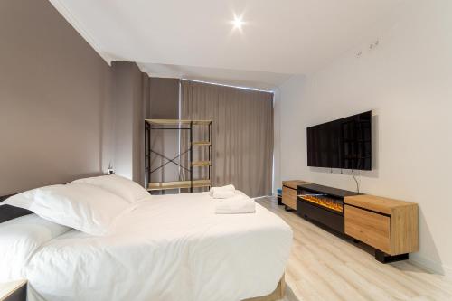 Ένα ή περισσότερα κρεβάτια σε δωμάτιο στο Albufera Dreams Nature Suites