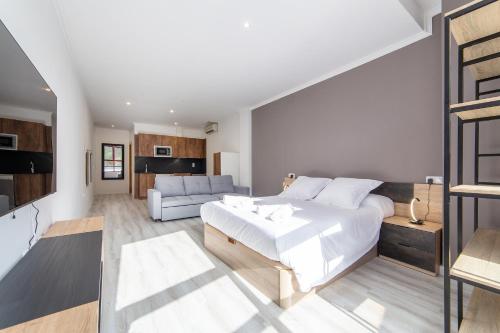Ένα ή περισσότερα κρεβάτια σε δωμάτιο στο Albufera Dreams Nature Suites