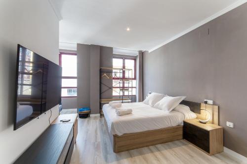 Ένα ή περισσότερα κρεβάτια σε δωμάτιο στο Albufera Dreams Nature Suites
