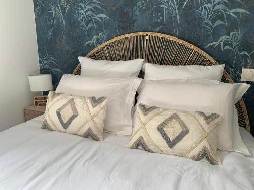 Postel nebo postele na pokoji v ubytování L'Elégant