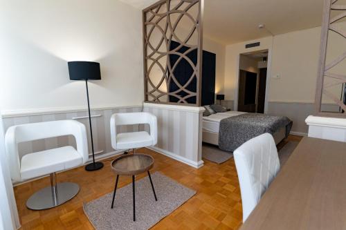 Χώρος καθιστικού στο Artearia Hotel
