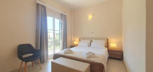 Posteľ alebo postele v izbe v ubytovaní Paleo Inn Hotel