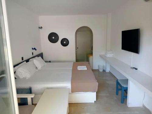 Postel nebo postele na pokoji v ubytování Apollon Resort
