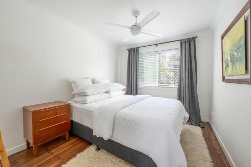 Ένα ή περισσότερα κρεβάτια σε δωμάτιο στο Sunray Riverside Apartment