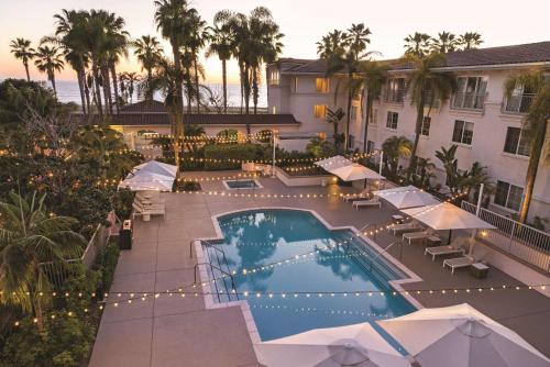 an overhead view of a hotel pool with lights at Hilton Garden Inn Carlsbad Beach in Carlsbad