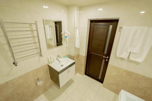 Un baño de Welcome Inn Hotel