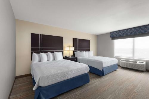 Ένα ή περισσότερα κρεβάτια σε δωμάτιο στο Hampton Inn & Suites Douglas