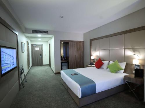 Ένα ή περισσότερα κρεβάτια σε δωμάτιο στο ibis Styles Istanbul Bomonti