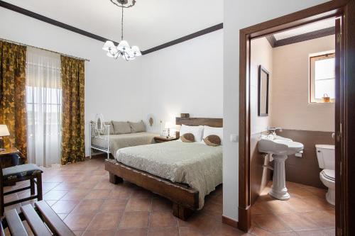 Katil atau katil-katil dalam bilik di Casas do Monte