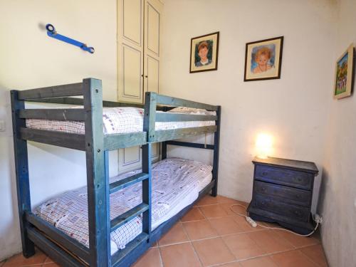 Ένα ή περισσότερα κρεβάτια σε δωμάτιο στο Holiday Home L'Oustaou dei Figo by Interhome