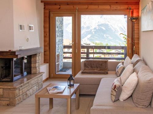 Et opholdsområde på Apartment Hauts de Nendaz A F3 by Interhome