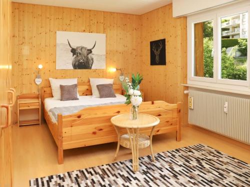 Ένα ή περισσότερα κρεβάτια σε δωμάτιο στο Apartment Belmont Ouest 75 by Interhome