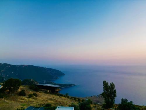 a view of the amalfi coast at sunset at Elm pansiyon in Fethiye