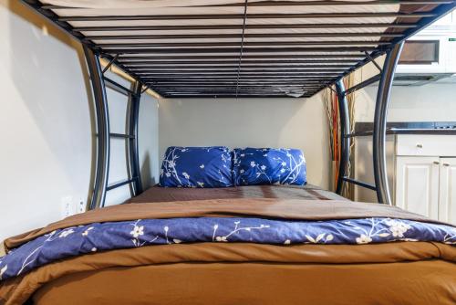 a bed with a canopy in a room at Studios in New York in New York