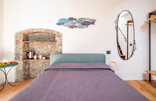 Postel nebo postele na pokoji v ubytování Pasini Luxury room,cozy winemakers retreat