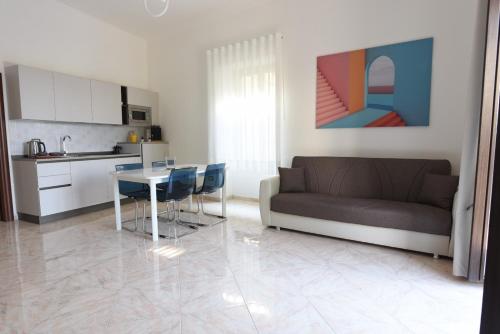 Kuchyň nebo kuchyňský kout v ubytování Domus Angriae Apartment