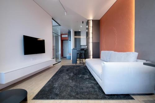 Una televisión o centro de entretenimiento en FORUM apartments