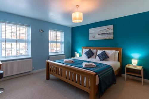Ένα ή περισσότερα κρεβάτια σε δωμάτιο στο Stylish Margate Coastal Home & Parking By Adliv