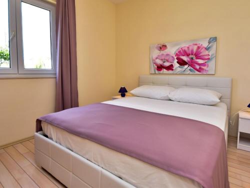 Ένα ή περισσότερα κρεβάτια σε δωμάτιο στο Apartment Melandura-8 by Interhome