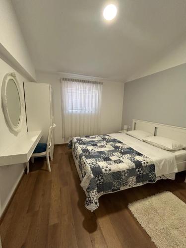 Ένα ή περισσότερα κρεβάτια σε δωμάτιο στο Apartman Lorna