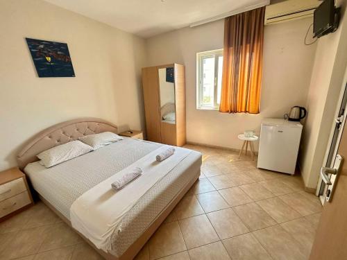 Postel nebo postele na pokoji v ubytování Apartments Ela