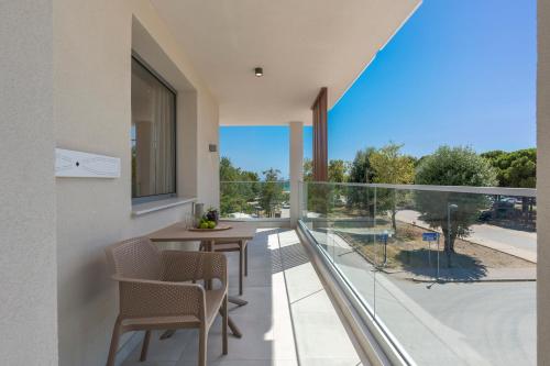 Φωτογραφία από το άλμπουμ του Sandy Seaside Suites στα Φλογητά