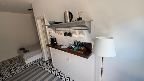 Kuchyň nebo kuchyňský kout v ubytování Apartment Ana