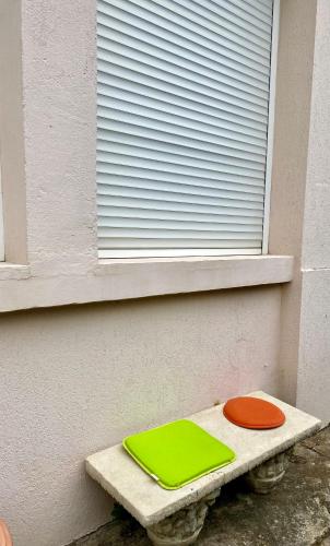 a window seat with two mats on it next to a window at Appartement intégral , Nanterre La Défense Paris , propre à côté de tous commodité in Nanterre