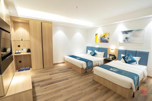 TV a/nebo společenská místnost v ubytování Hotel Miamor