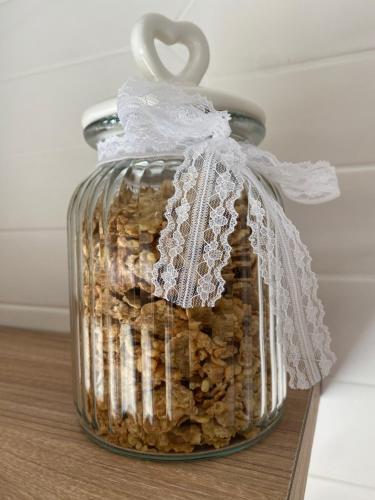 a glass jar filled with rocks on a table at Ninfa Roda B&B in Vietri sul Mare