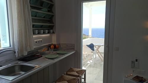 Η κουζίνα ή μικρή κουζίνα στο Aegean Dream Apartments 