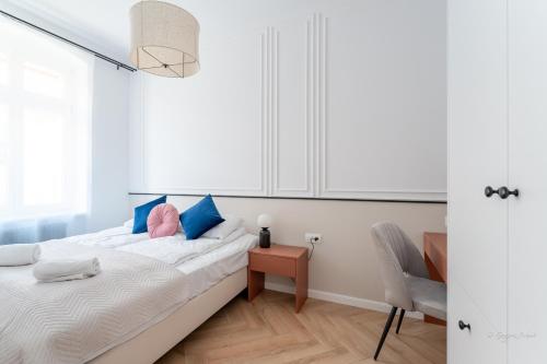 Postel nebo postele na pokoji v ubytování Apartament Moon Deer - przy deptaku - by SpaceApart