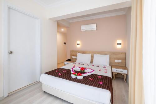Postel nebo postele na pokoji v ubytování Viking Beach Hotel & Spa