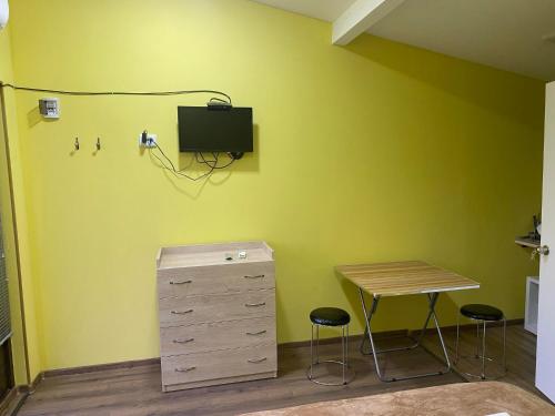 TV a/nebo společenská místnost v ubytování Hotel studio deluxe Sauna