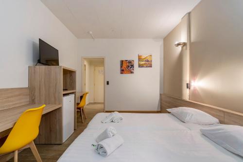 Sleep & Go Brussels Southにあるベッド