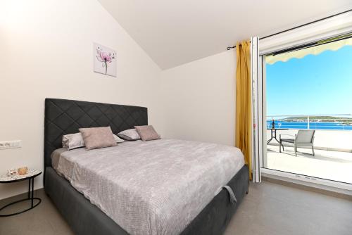Ένα ή περισσότερα κρεβάτια σε δωμάτιο στο Lity Apartment Lily