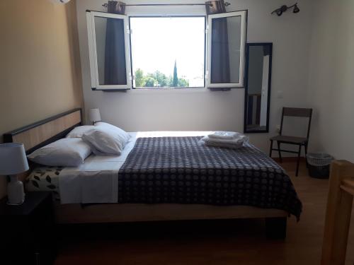 Posteľ alebo postele v izbe v ubytovaní Galotel Agnoudas near the airport