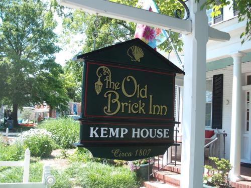 a sign for the old brick inn kent house at Old Brick Inn in Saint Michaels